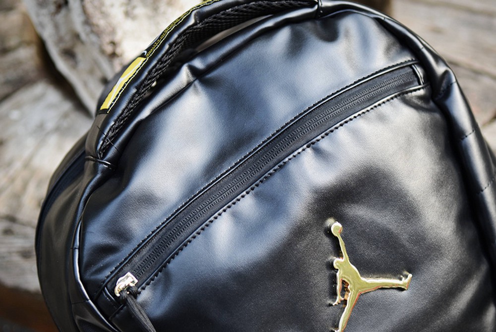 aj12黑金双肩包书包1
